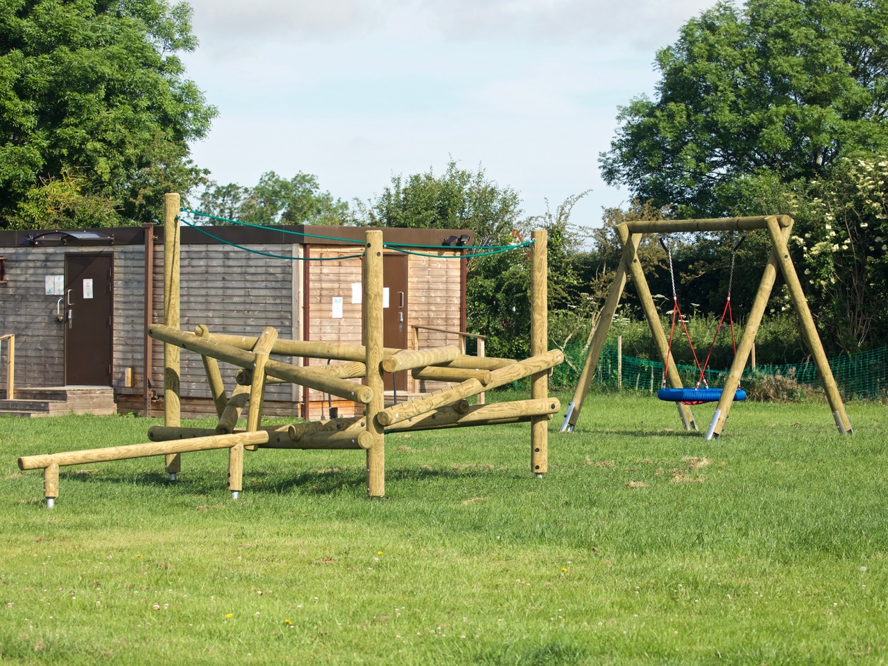 Log pile and basket swing